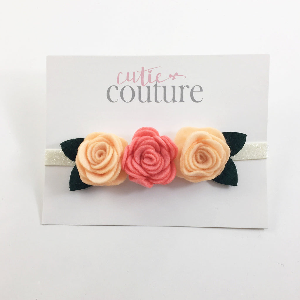 Donna- Peach and coral felt flowers on an ivory glitter headband
