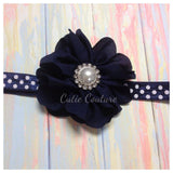 Penelope- Navy flower with pearl on a polka dot headband
